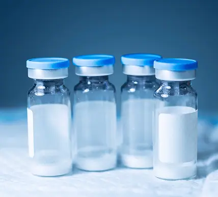 Lyophilized injection vials showing the freeze-dried cake